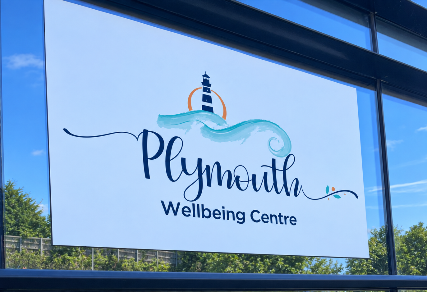 The Plymouth Wellbeing Centre sign in the window at Lynher House, Bush Park, Estover, on a sunny day