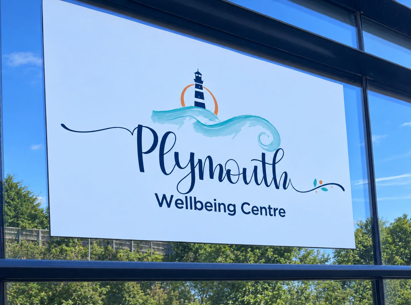 The Plymouth Wellbeing Centre sign in the window at Lynher House, Bush Park, Estover, on a sunny day